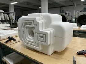 Hybrid foam pattern assembly combining CNC-machined cores with steam-molded outer shell sections